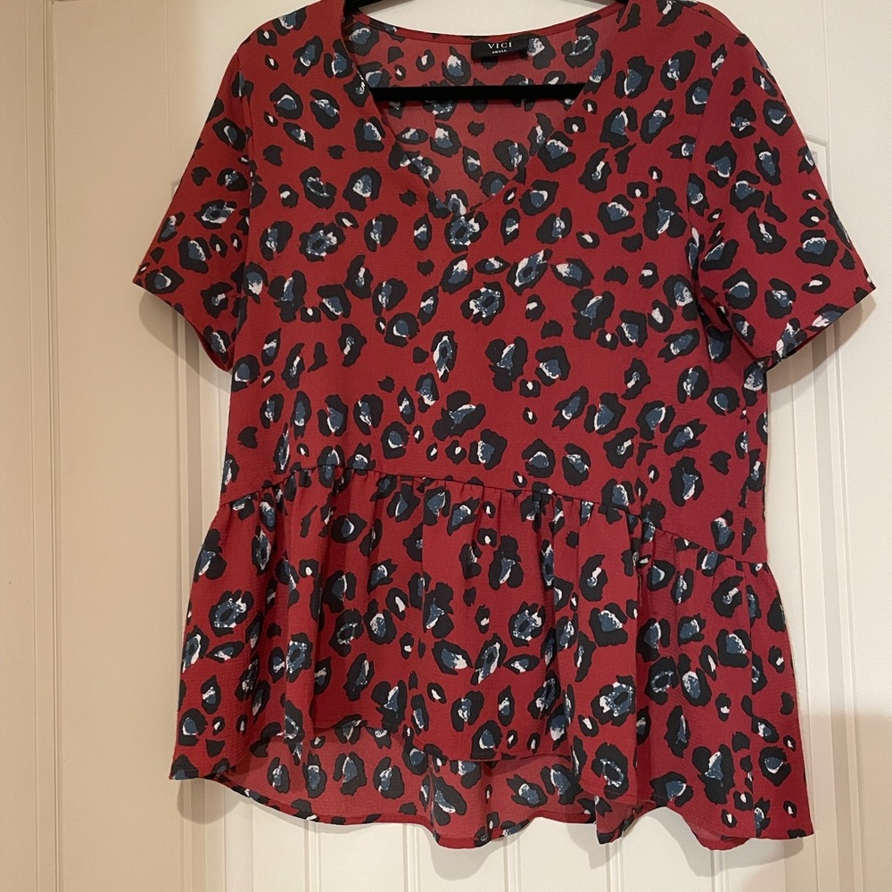 Vici cheetah print peplum blouse